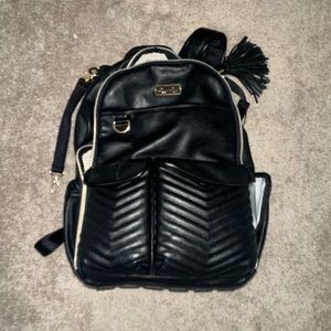 a roomy main compartment and easy-access opening, our backpack-style diaper bag